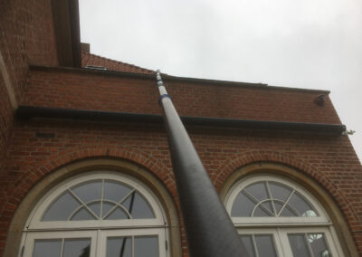 Tagrenderens af høj bygning.